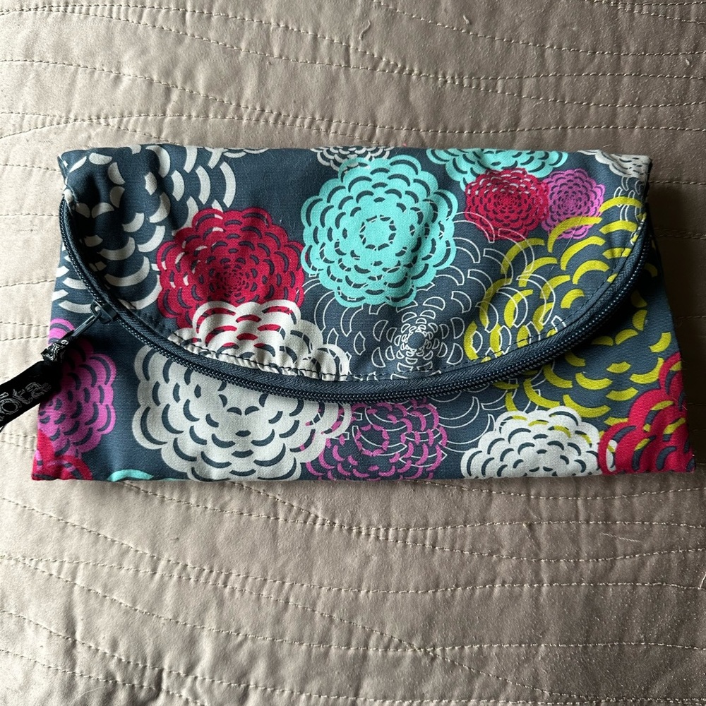 Iota zip travel clutch bag